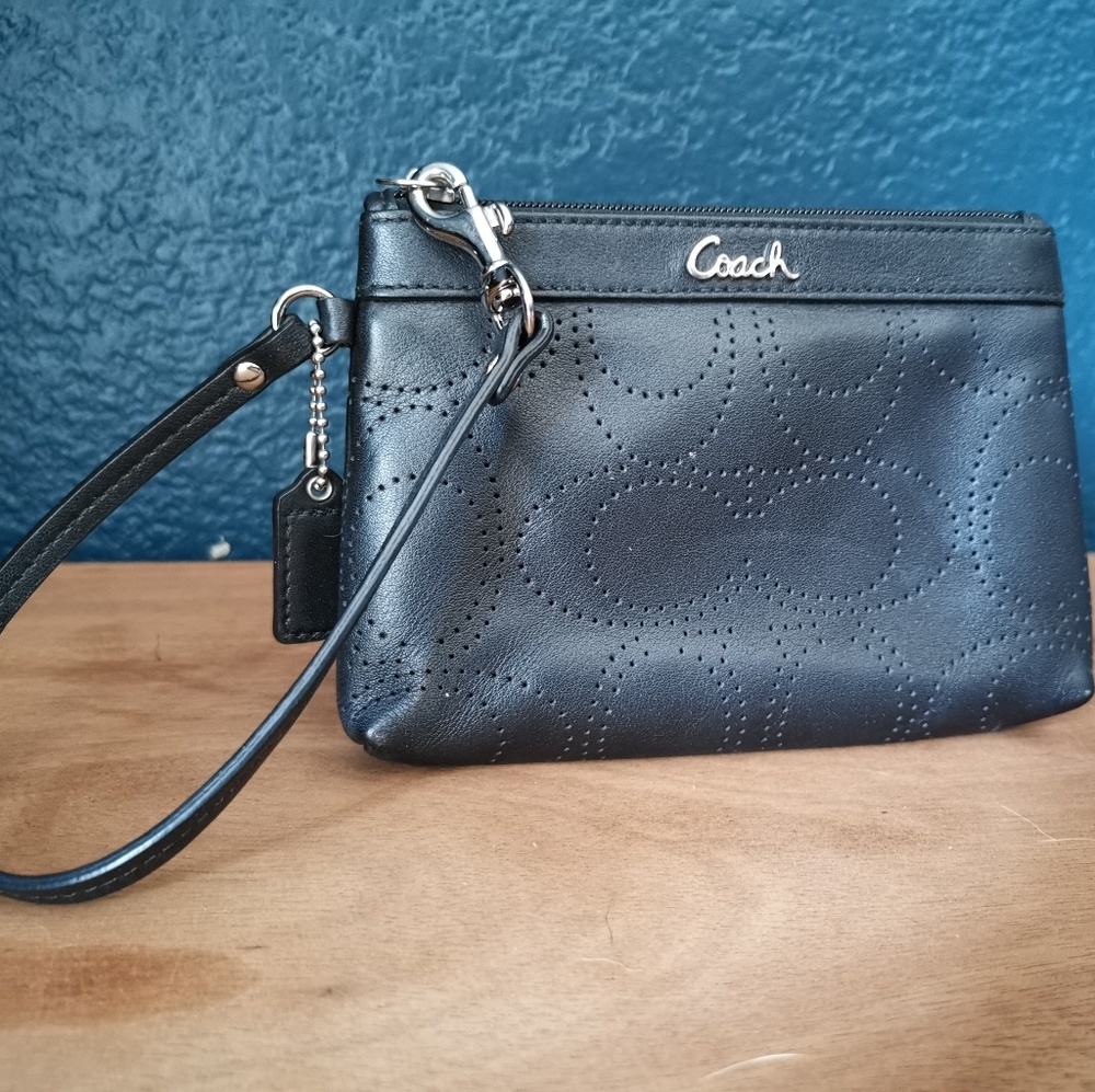 Black Leather Coach wristlet, like new.